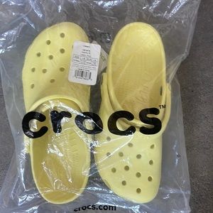 Yellow crocs. Men’s size 10. Never worn. Like new